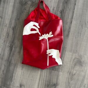 Loves Me Loves Me Not Red Tote Bag with Artistic White Design